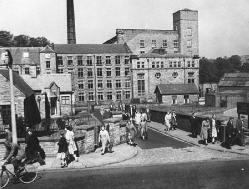 Workers leave Waterhouse Mill, Bollington, Cheshire, UK (1959)